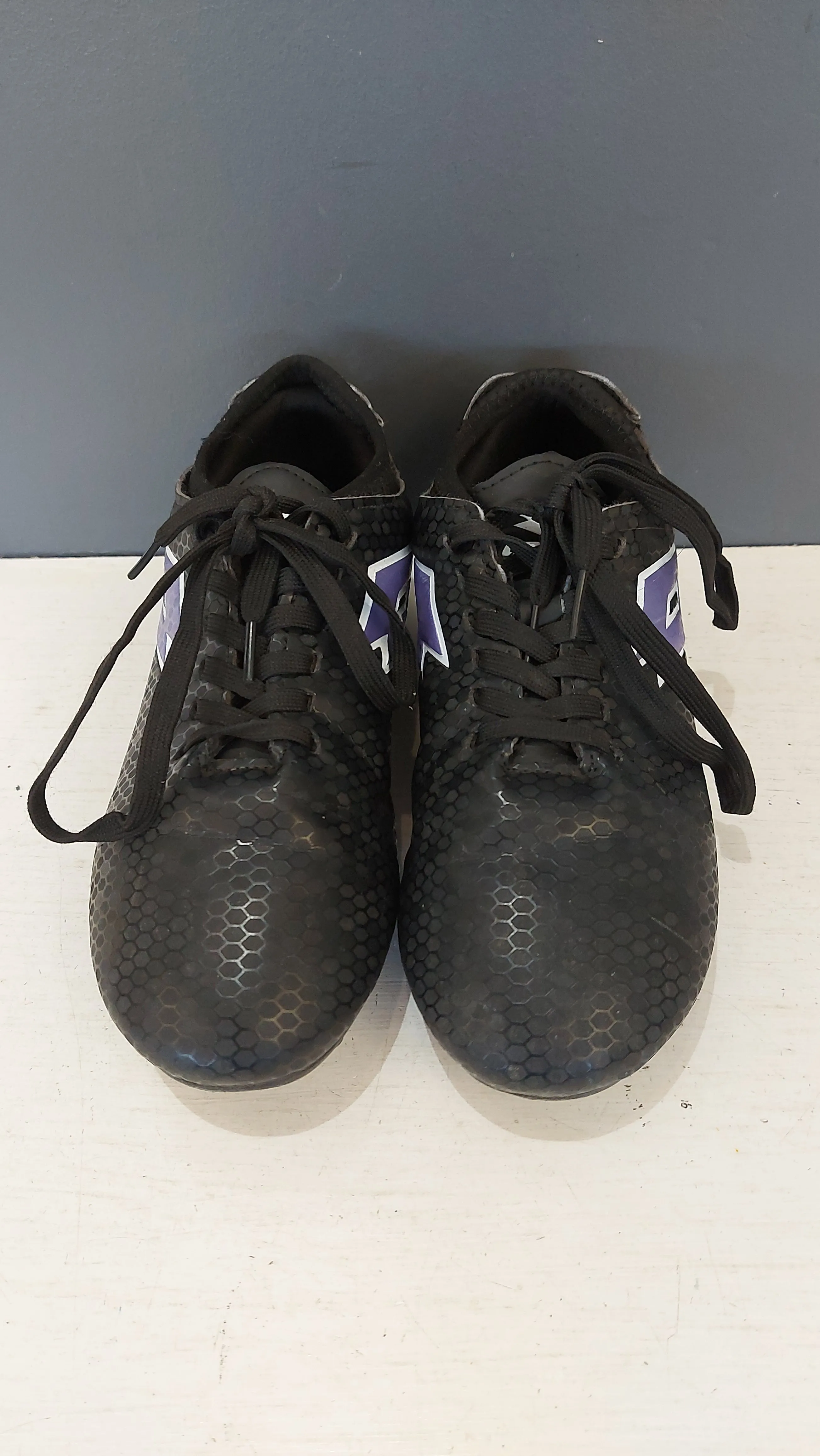 Lotto black cleats 3